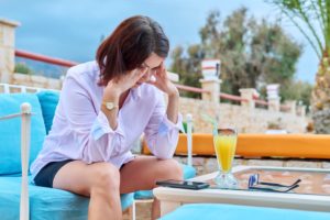 Woman looking at Phone Not Charging